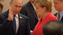 Merkel w rosyjskiej prasie: Budujmy pokój z udziałem Rosji