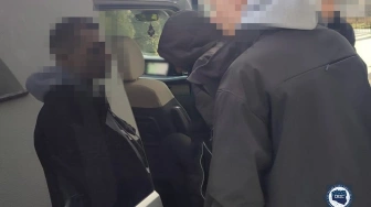 Atakował strony internetowe z całego świata. 20-latek w rękach policji