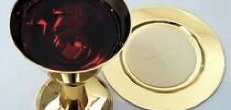 Zakaz komunii pod dwiema postaciami uchroni przed świńską grypą?